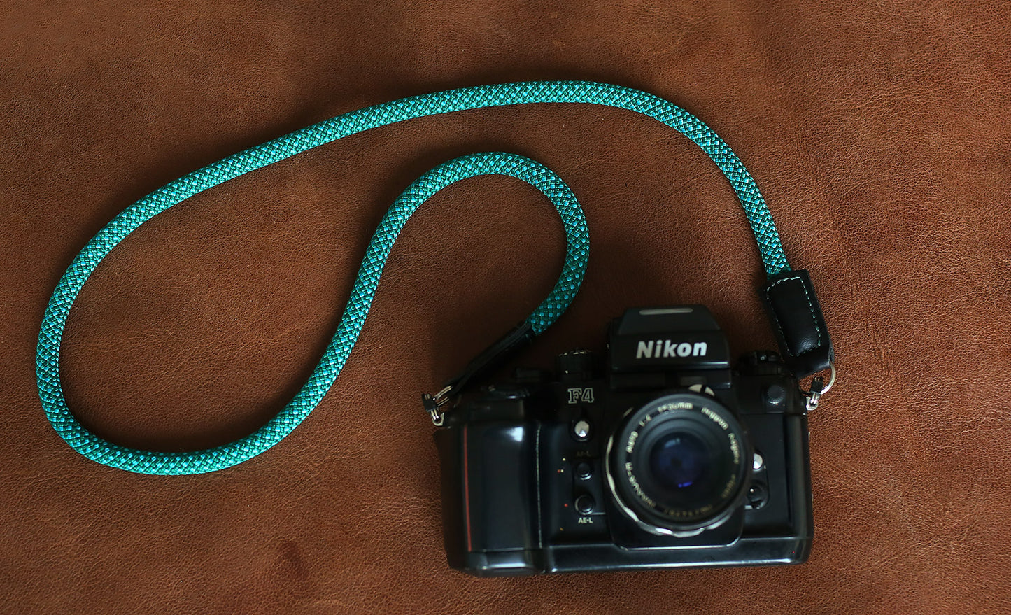 Handmade green climbing rope strap for mirrorless, SLR, and film cameras