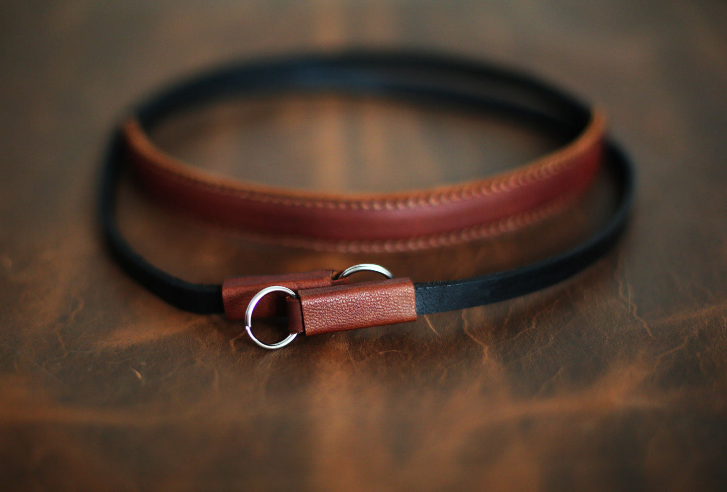 Windmup brown and black strap styled with vintage camera