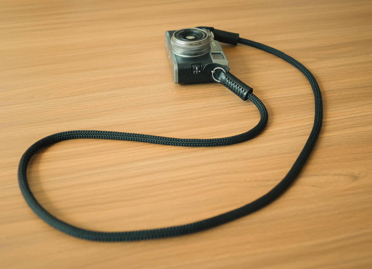 black climbing rope camera strap with leather ends