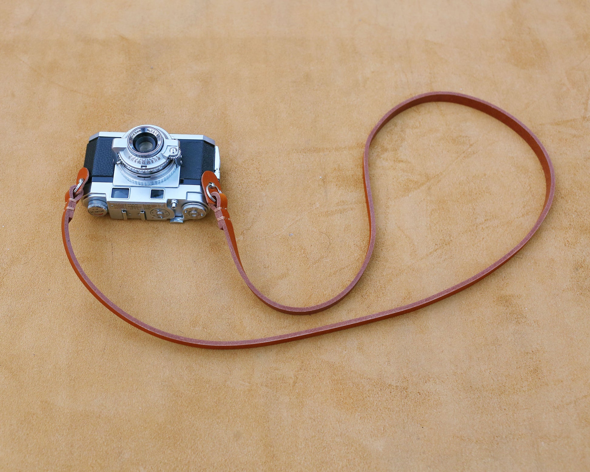 Artisan-made brown leather camera accessory for professional photographers