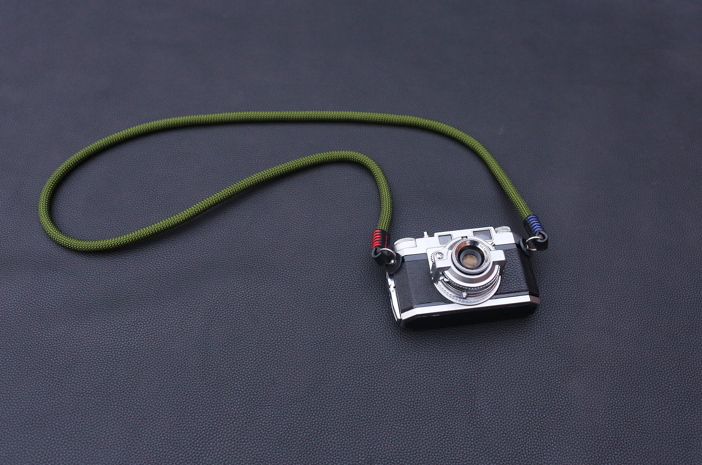 handmade climbing rope camera strap with red blue stitching