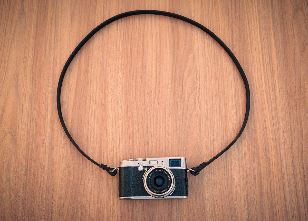 Handmade 10mm black full-grain buffalo leather camera strap by Windmup