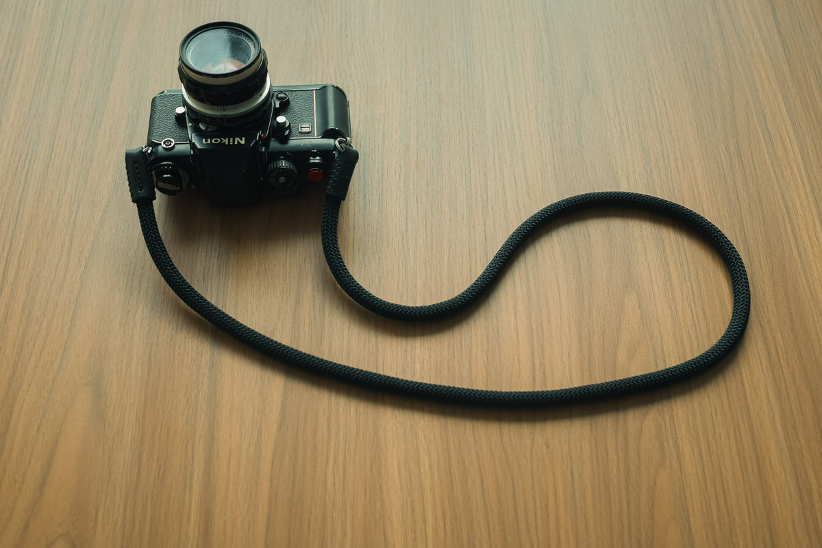 Black climbing rope camera strap for travel photography