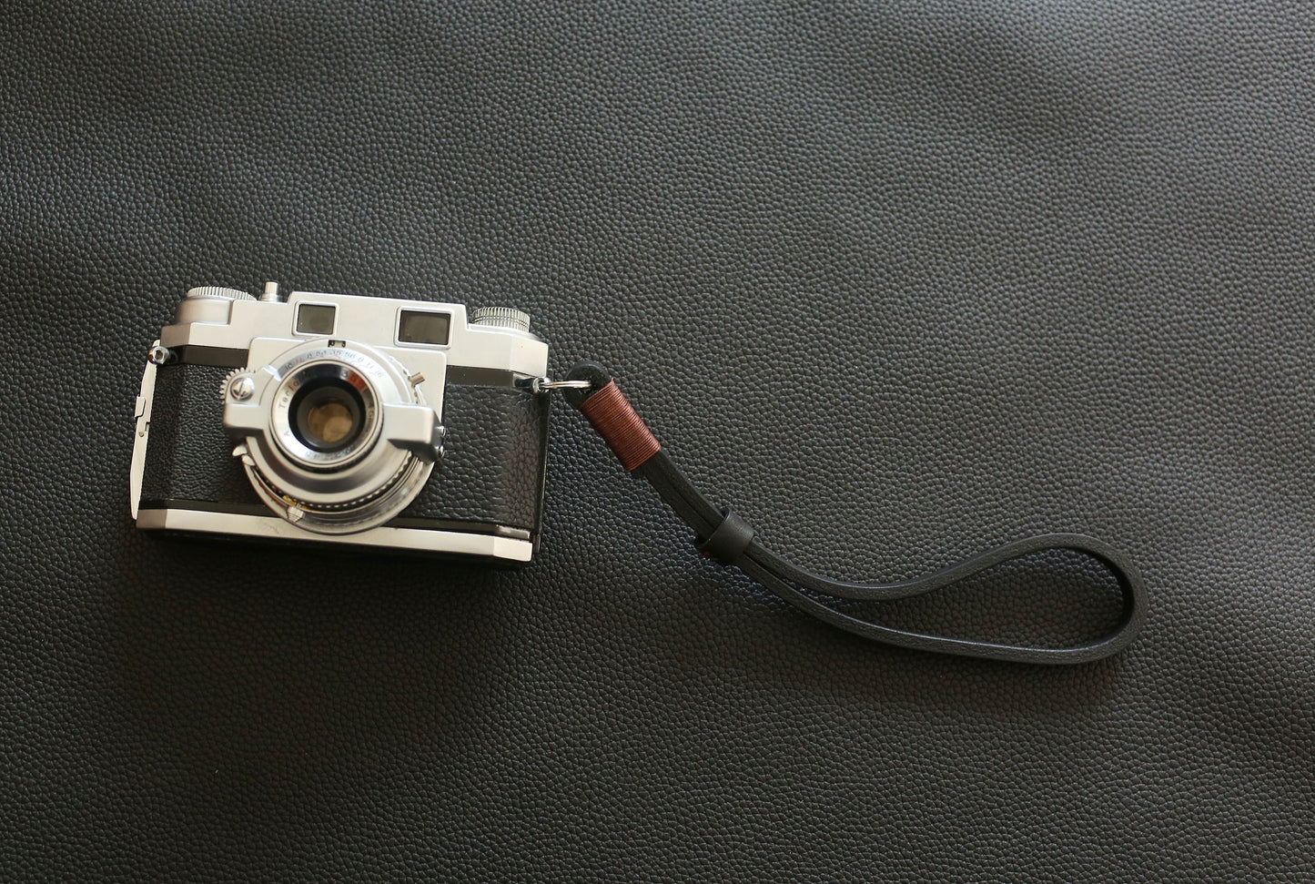 4mm leather camera wrist strap with customizable hand-stitched waxed thread