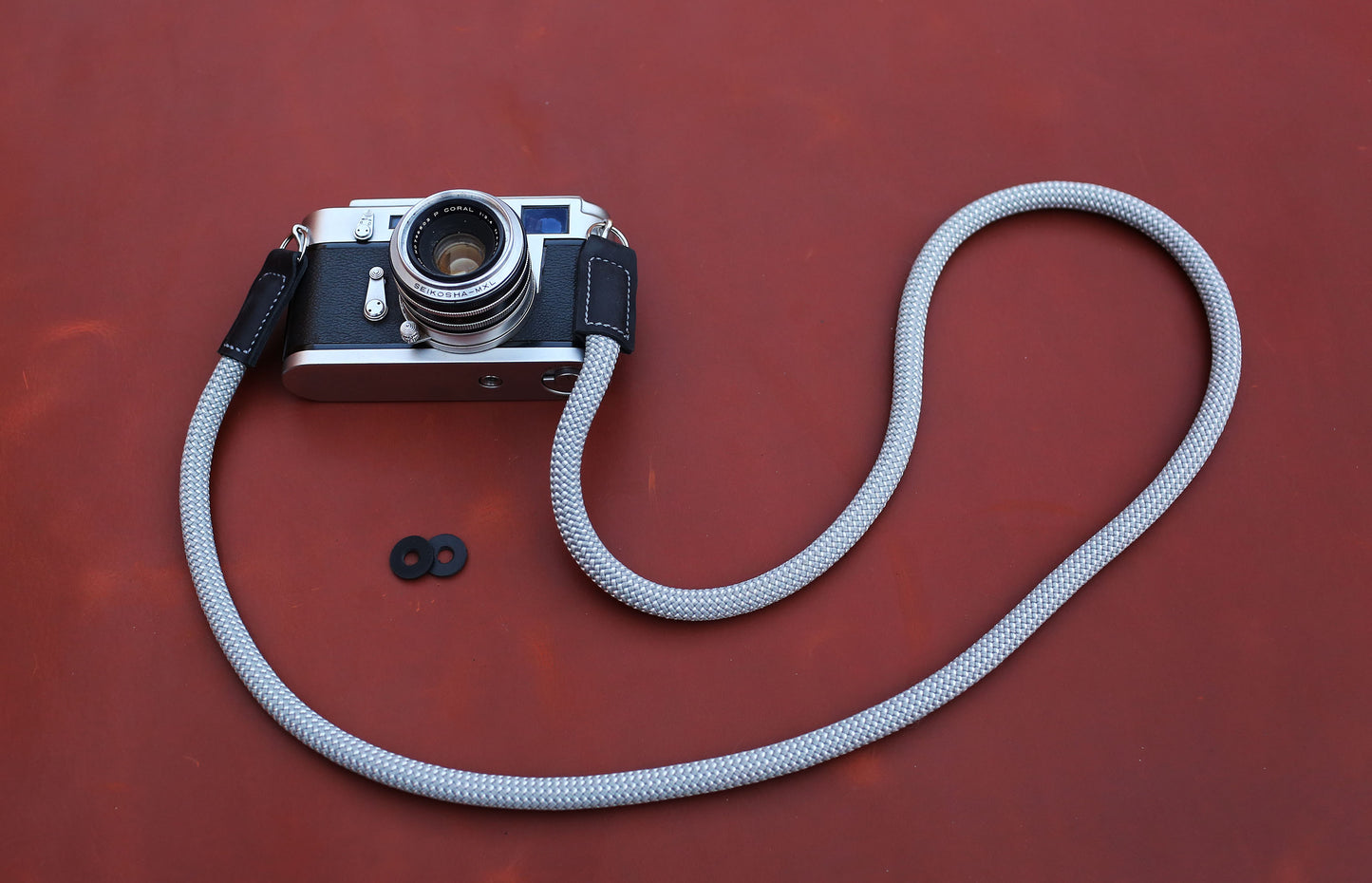 Industrial strength 10mm red climbing rope strap for outdoor photography.