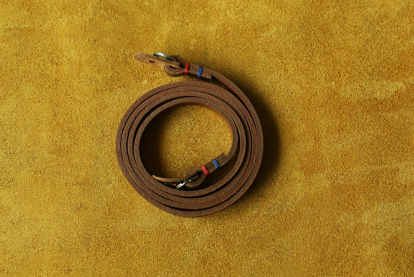Ergonomic handmade leather camera sling for all-day comfort