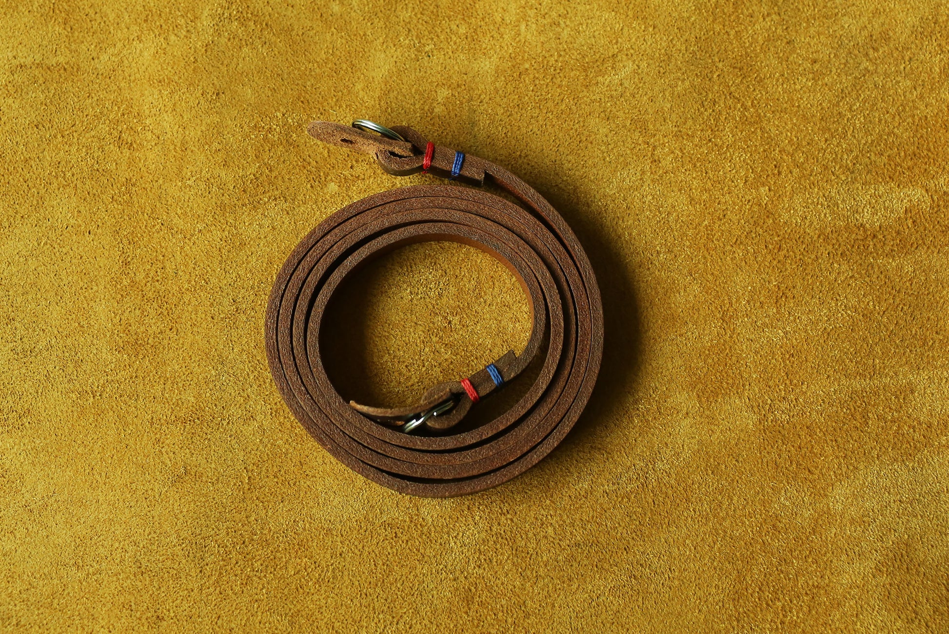 Ergonomic handmade leather camera sling for all-day comfort