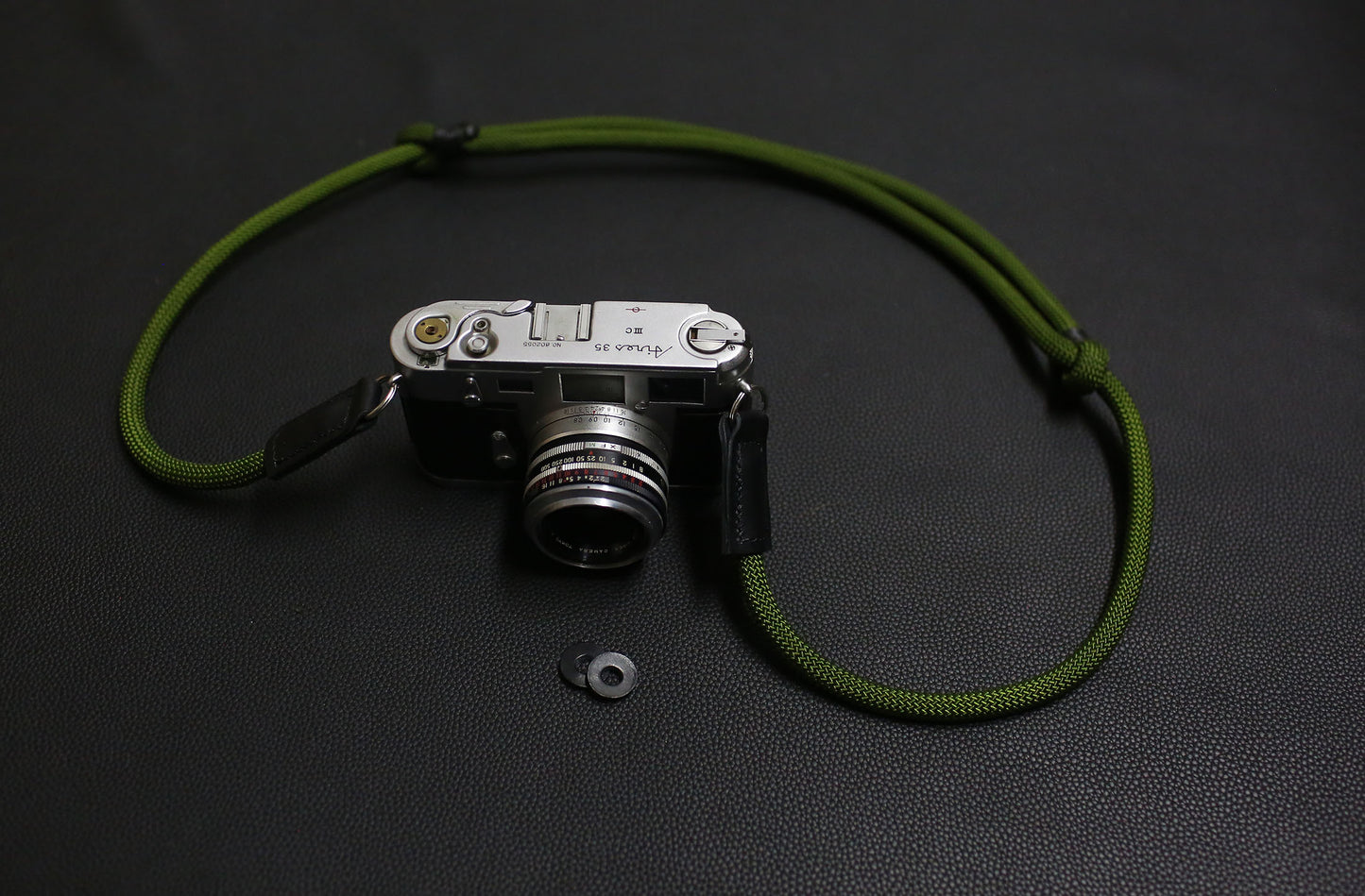 Mountaineering-grade rope strap in classic red color