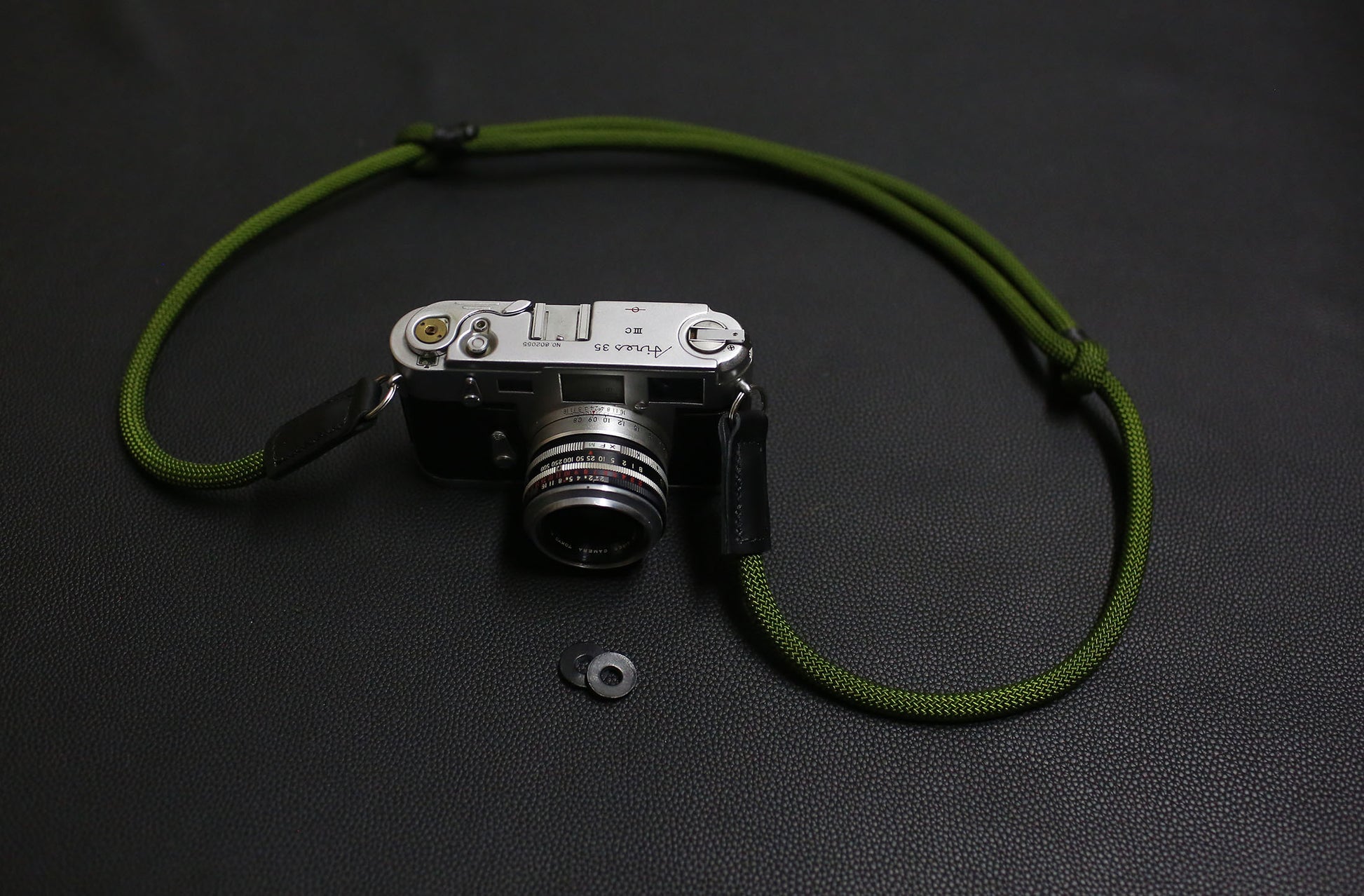 Mountaineering-grade rope strap in classic red color