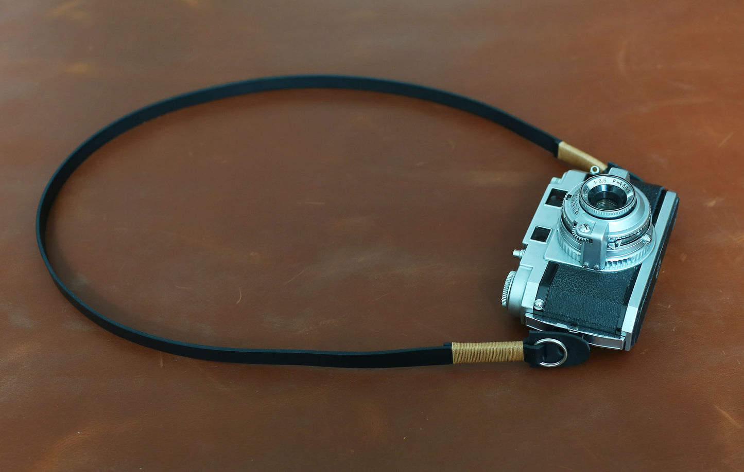 Handmade black nubuck leather camera strap by Windmup for mirrorless and film cameras