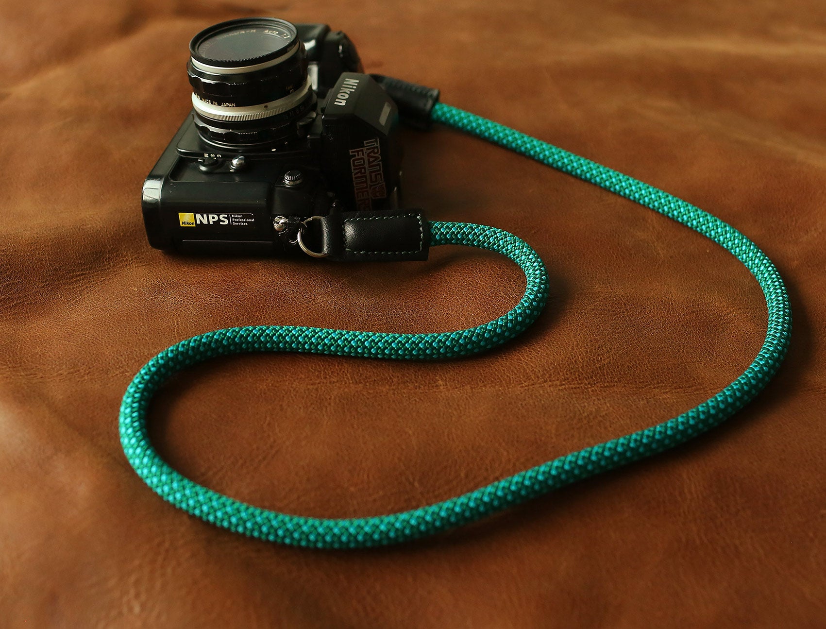 Close-up of green and light blue woven climbing rope texture – 10mm