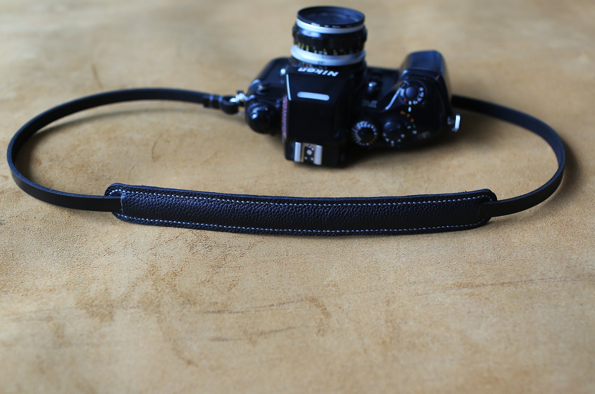 Handmade black leather camera strap with wide shoulder pad