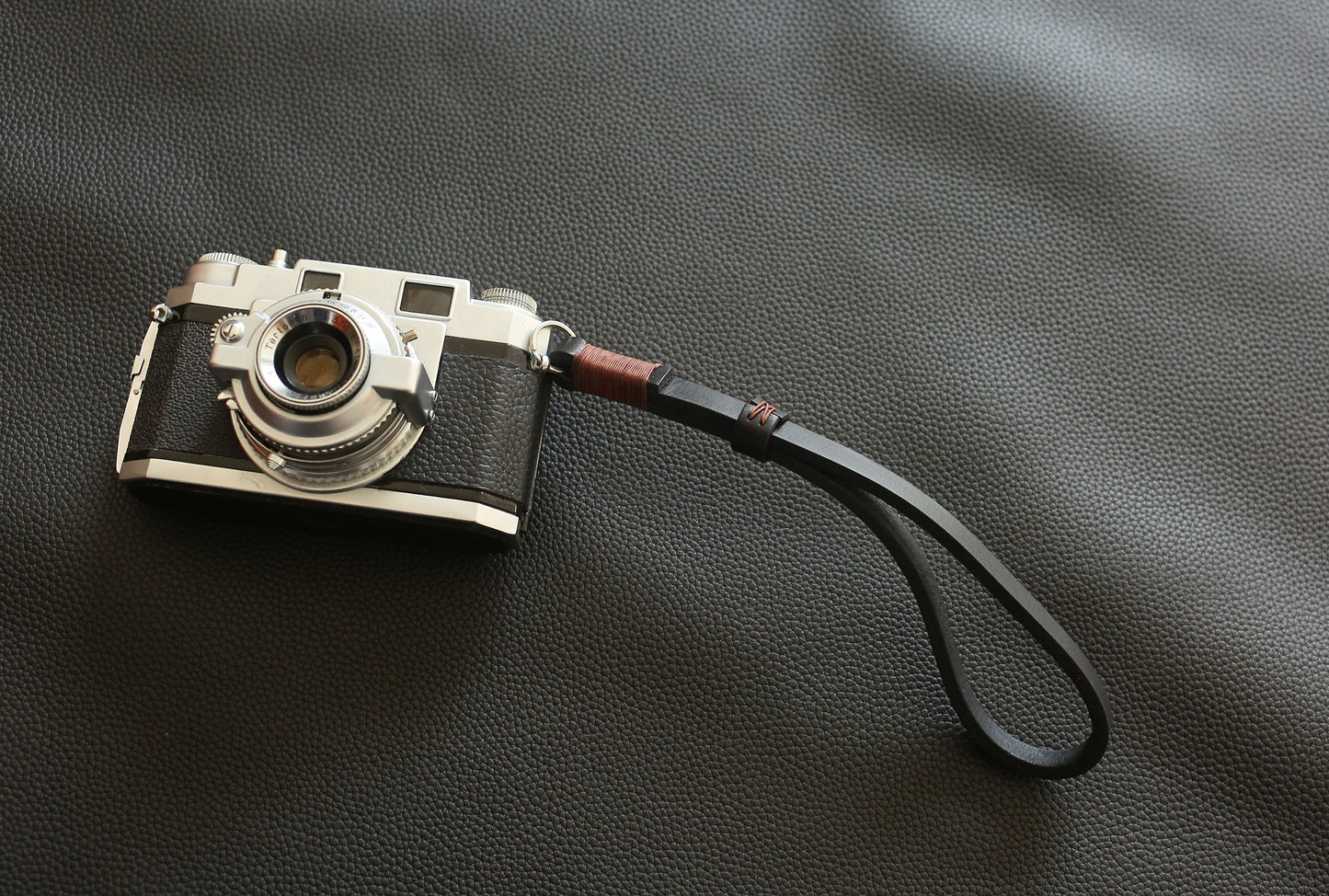 Handcrafted heavy-duty 4mm buffalo leather camera wrist strap in black
