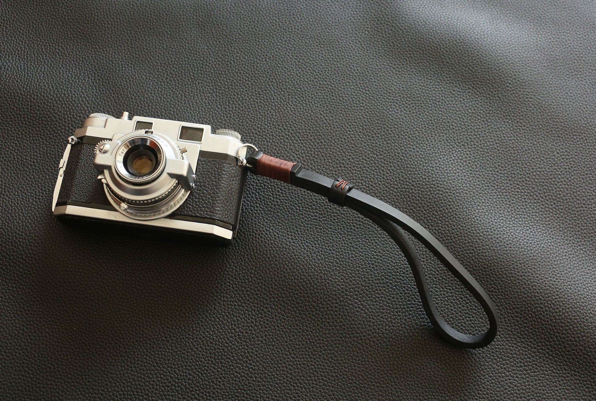 Handcrafted heavy-duty 4mm buffalo leather camera wrist strap in black