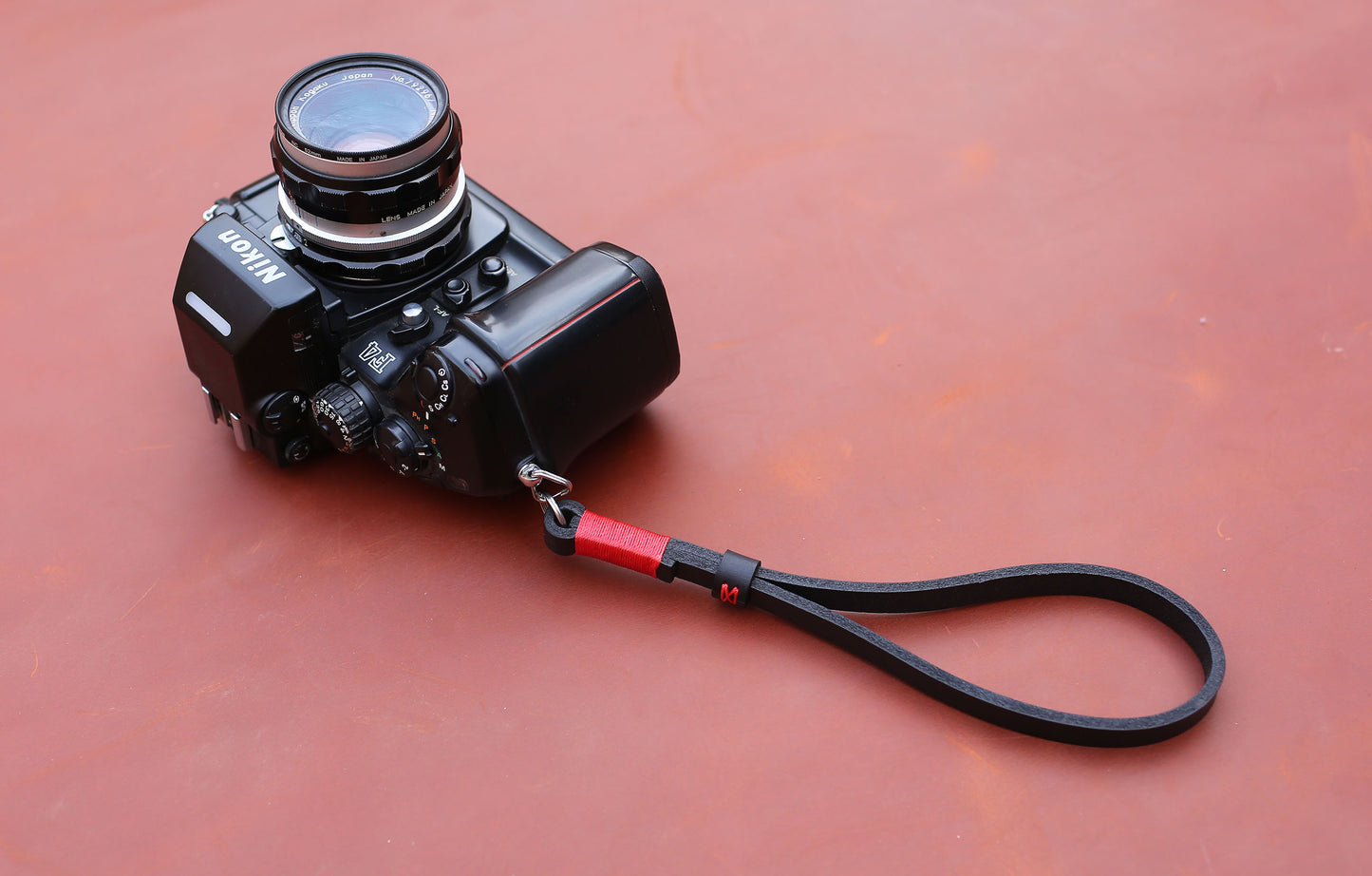 Durable leather wrist strap compatible with Leica, Fujifilm, and Sony cameras