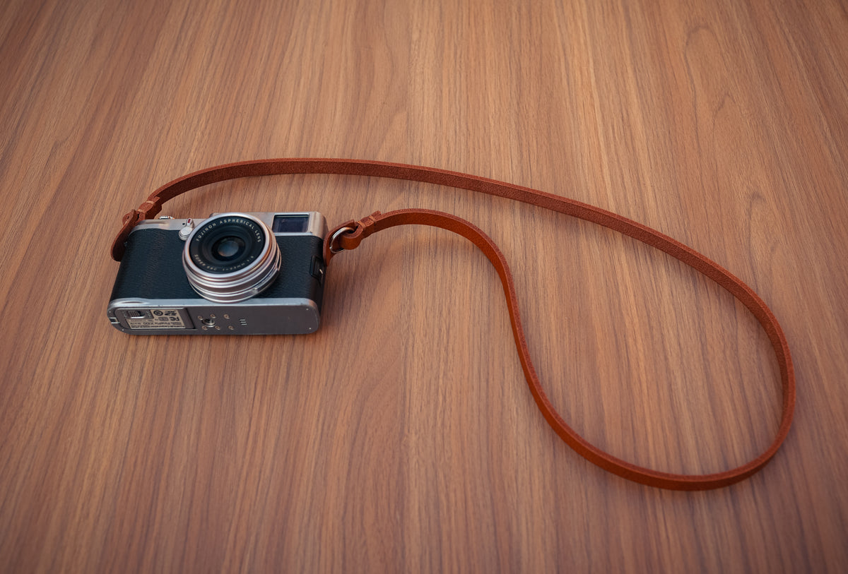 Light brown vegetable-tanned leather camera strap