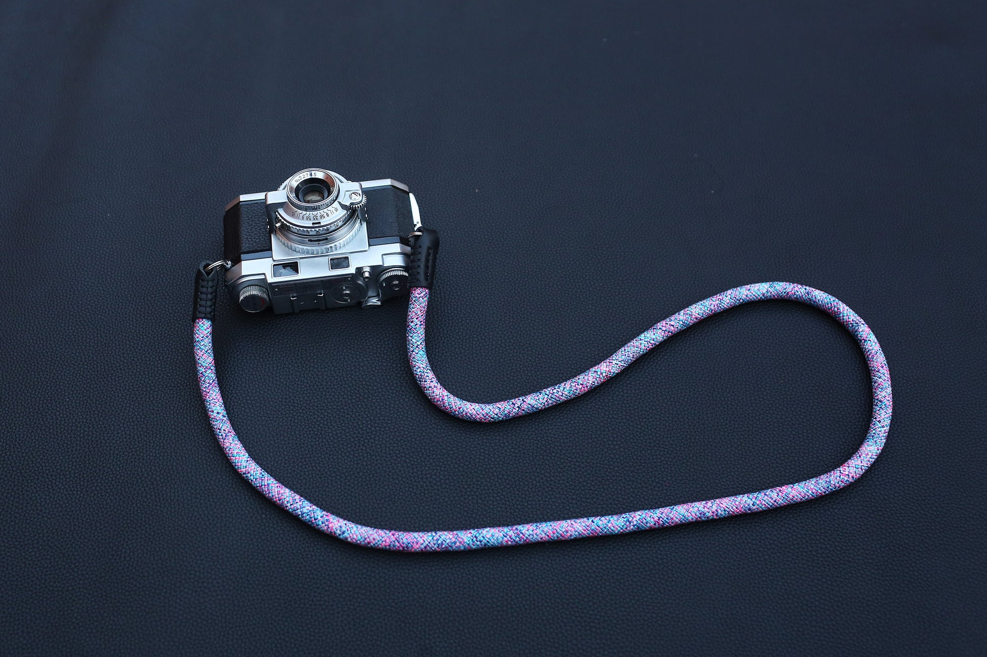 Lightweight violet elastic camera strap designed for everyday photography