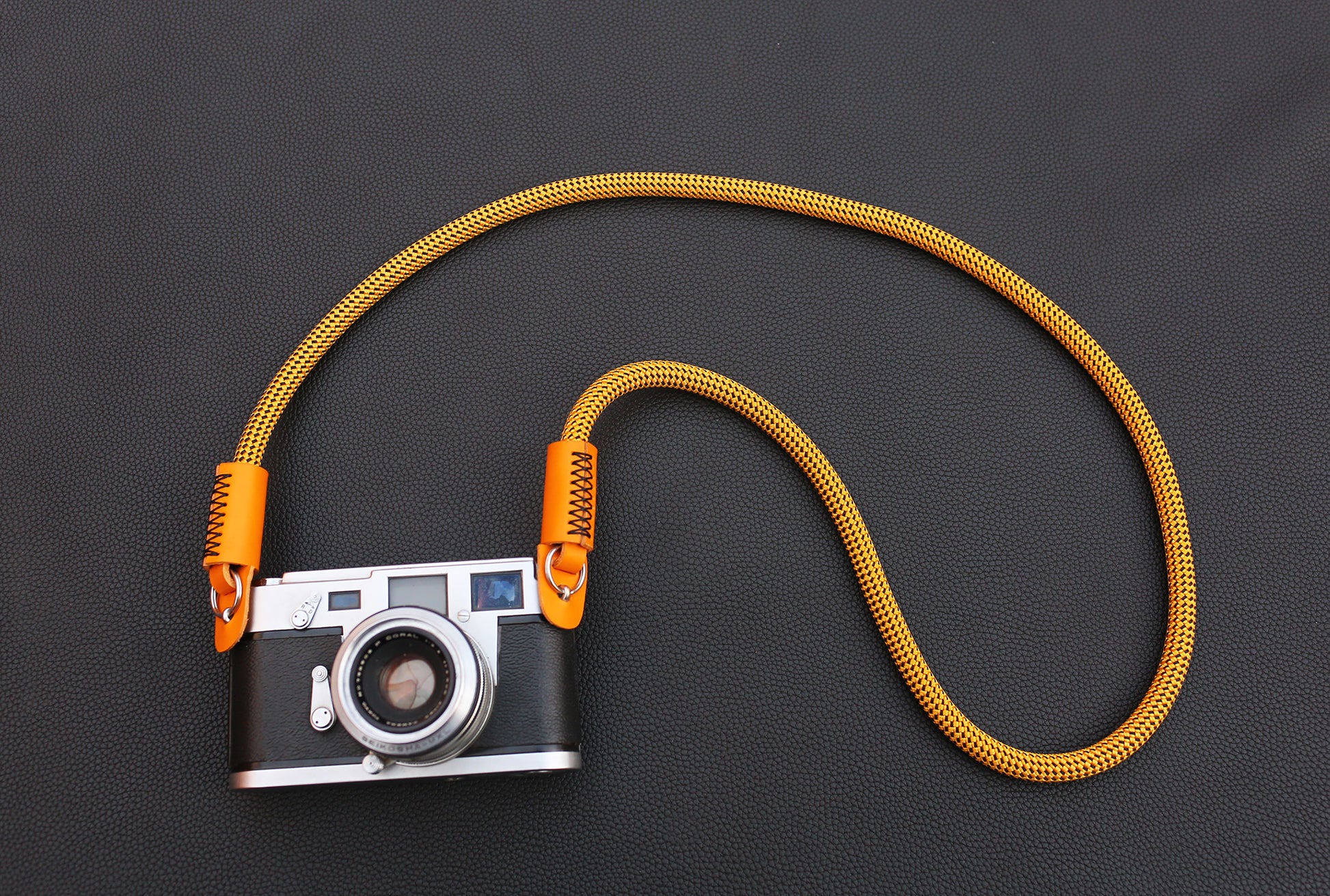 Minimalist gold rope camera strap for daily photography use