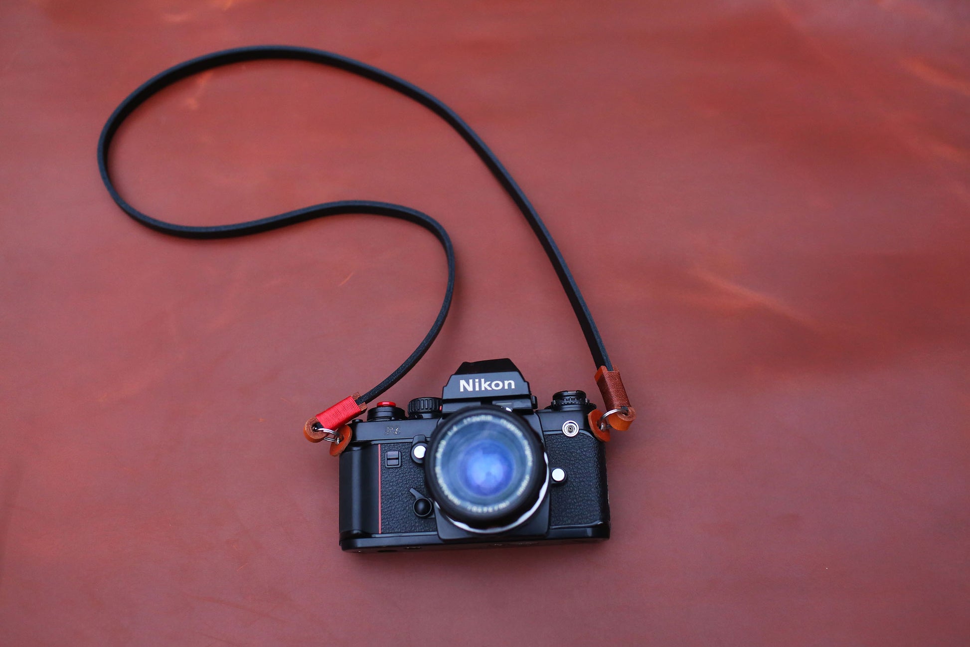 Photographer wearing Windmup strap chest-hang style