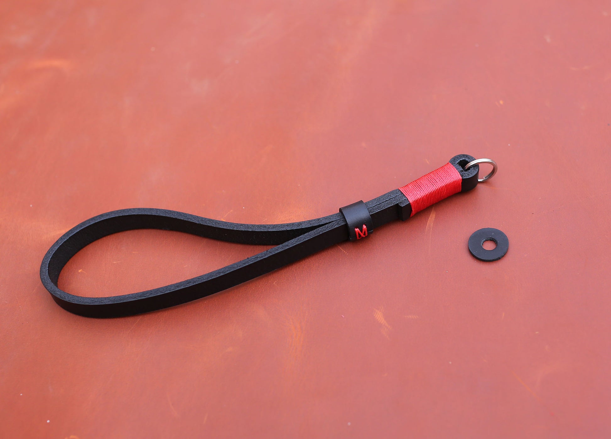 Minimalist leather camera wrist strap ideal for street and travel photography