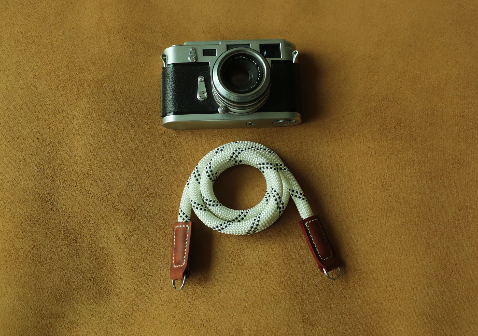 Premium vegetable-tanned leather camera strap in white and brown