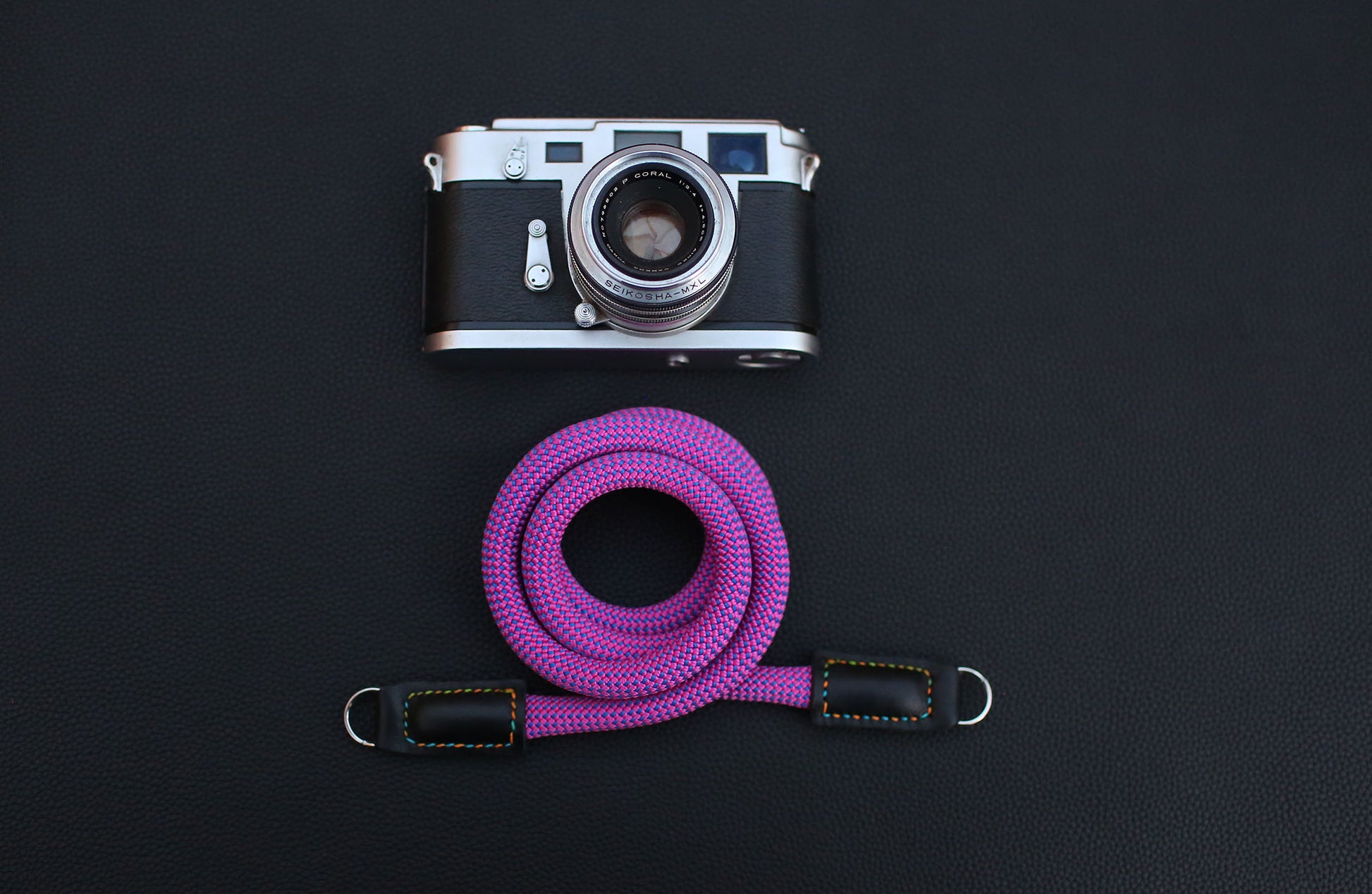 purple camera strap product photo