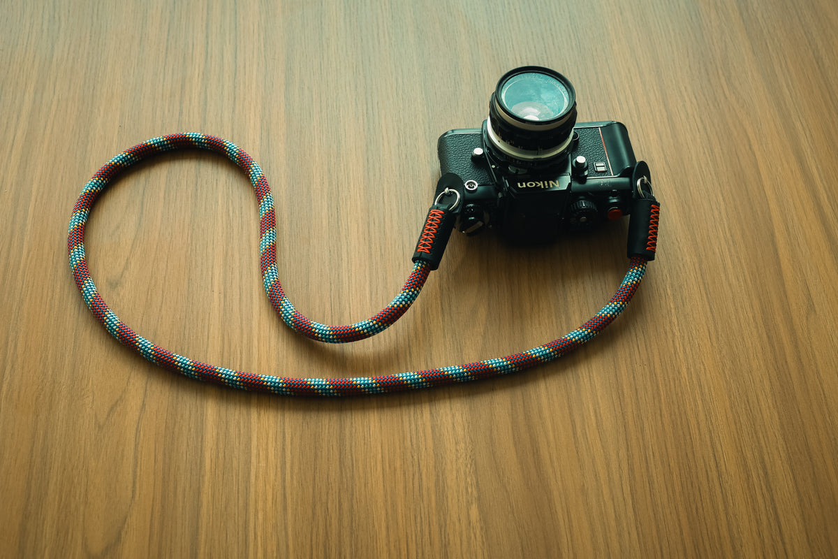stitching.jpgRed waxed-thread hand stitching on camera strap