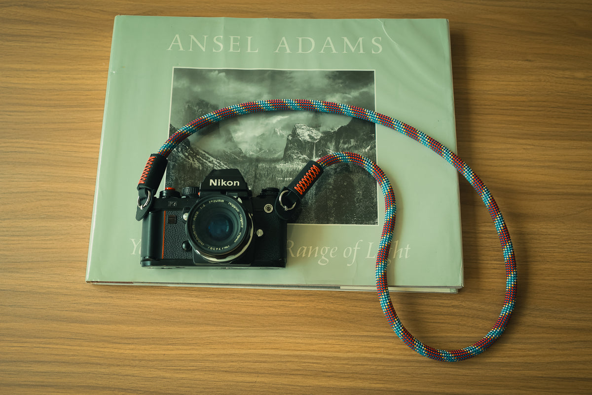 Trail Companion rope camera strap on a film camera