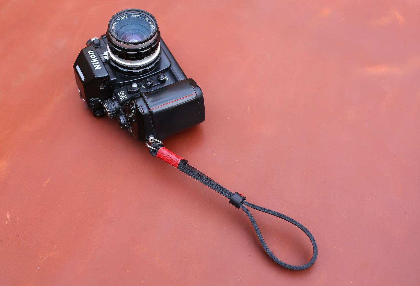 Vegetable-tanned full-grain leather camera strap in vintage minimalist style