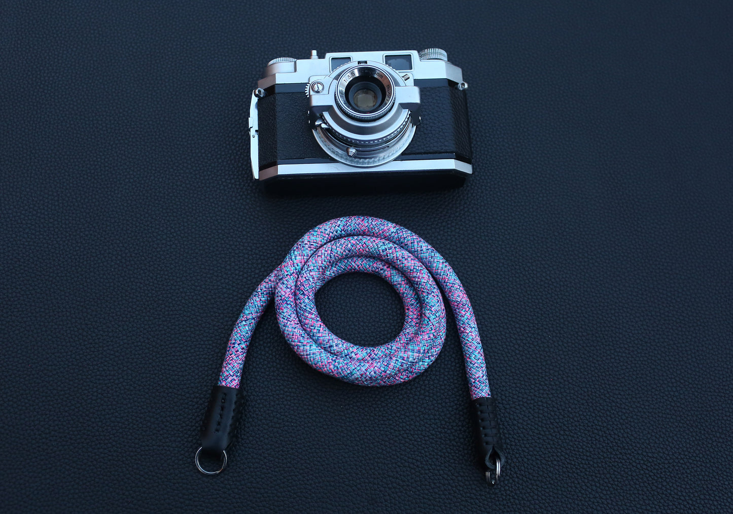 Violet elastic camera strap designed for lightweight and soft carry preference