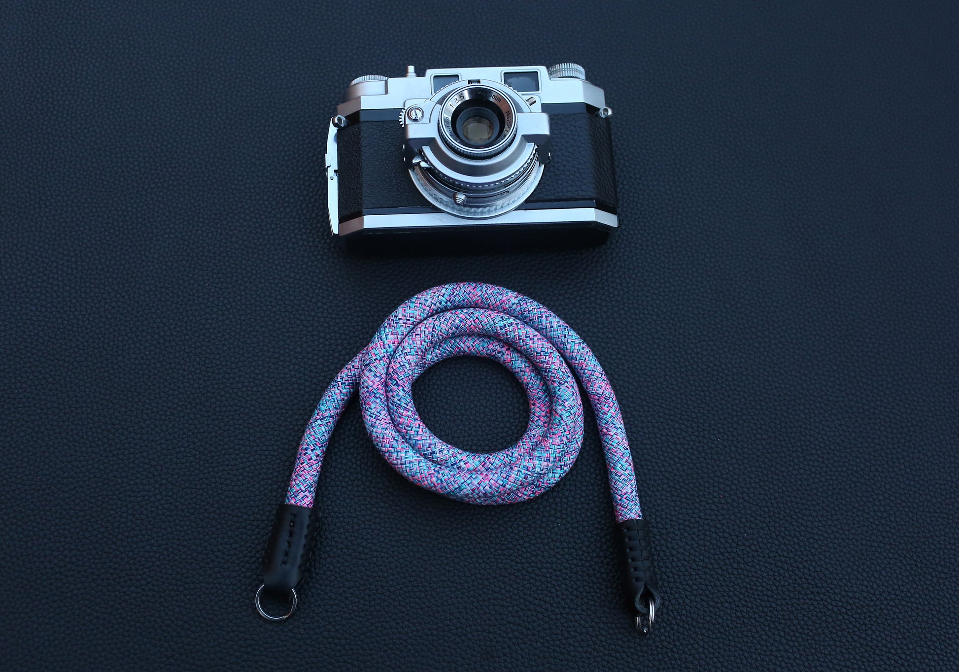 Violet elastic camera strap designed for lightweight and soft carry preference