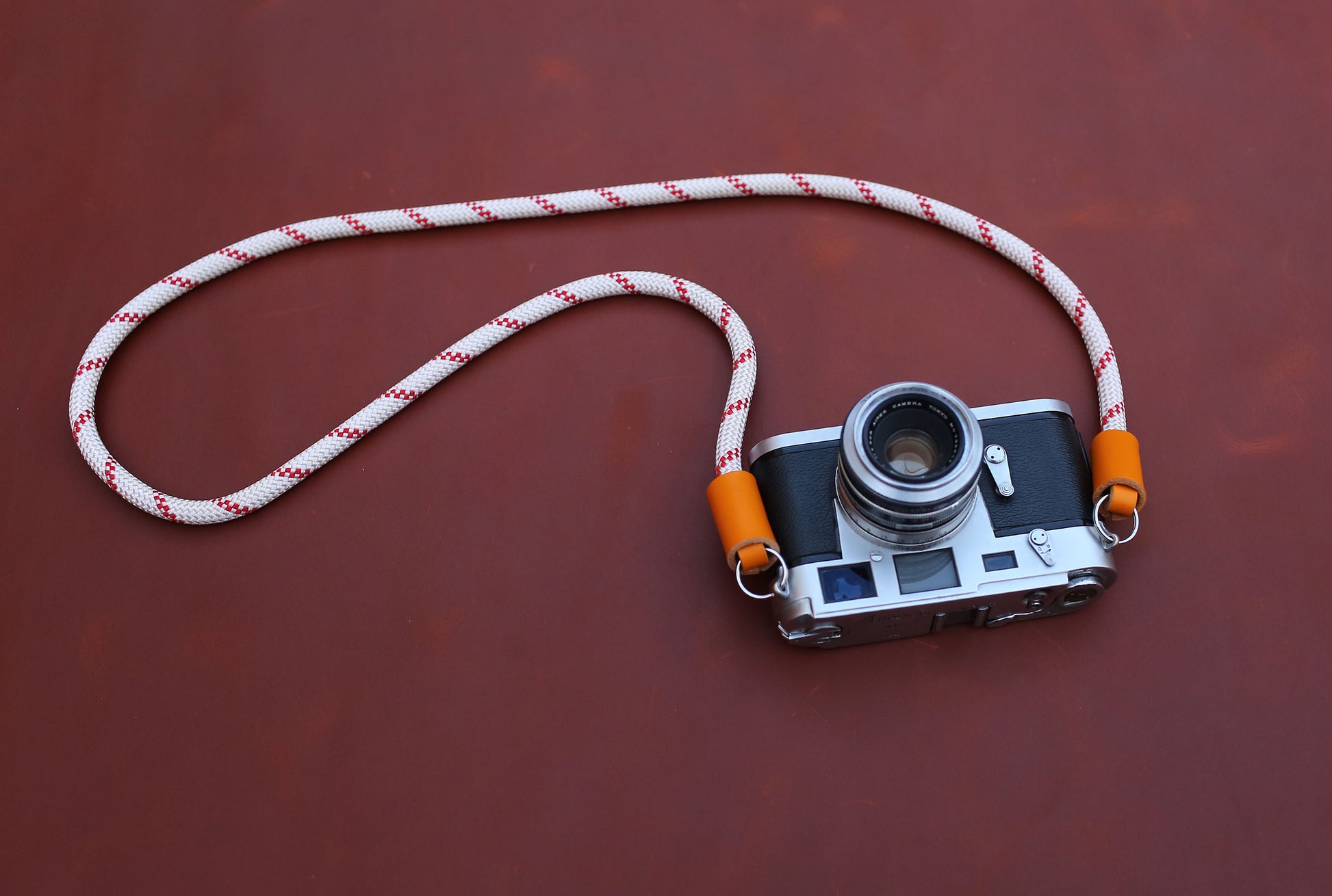 Weather-resistant climbing rope strap for outdoor photography.