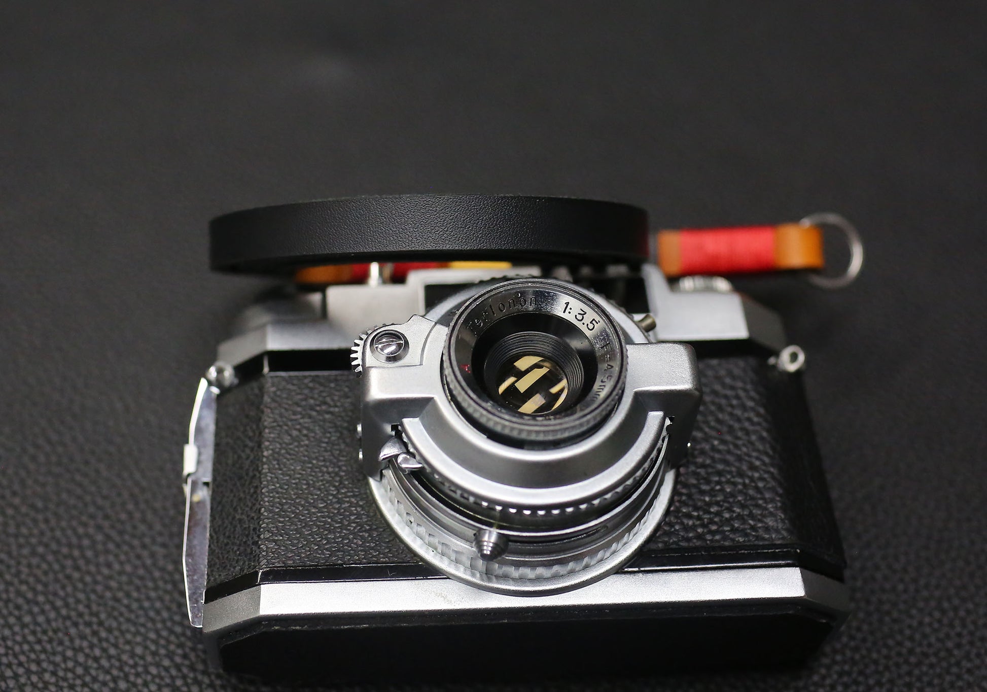 Windmup handmade strap for film camera showing clean minimal design.