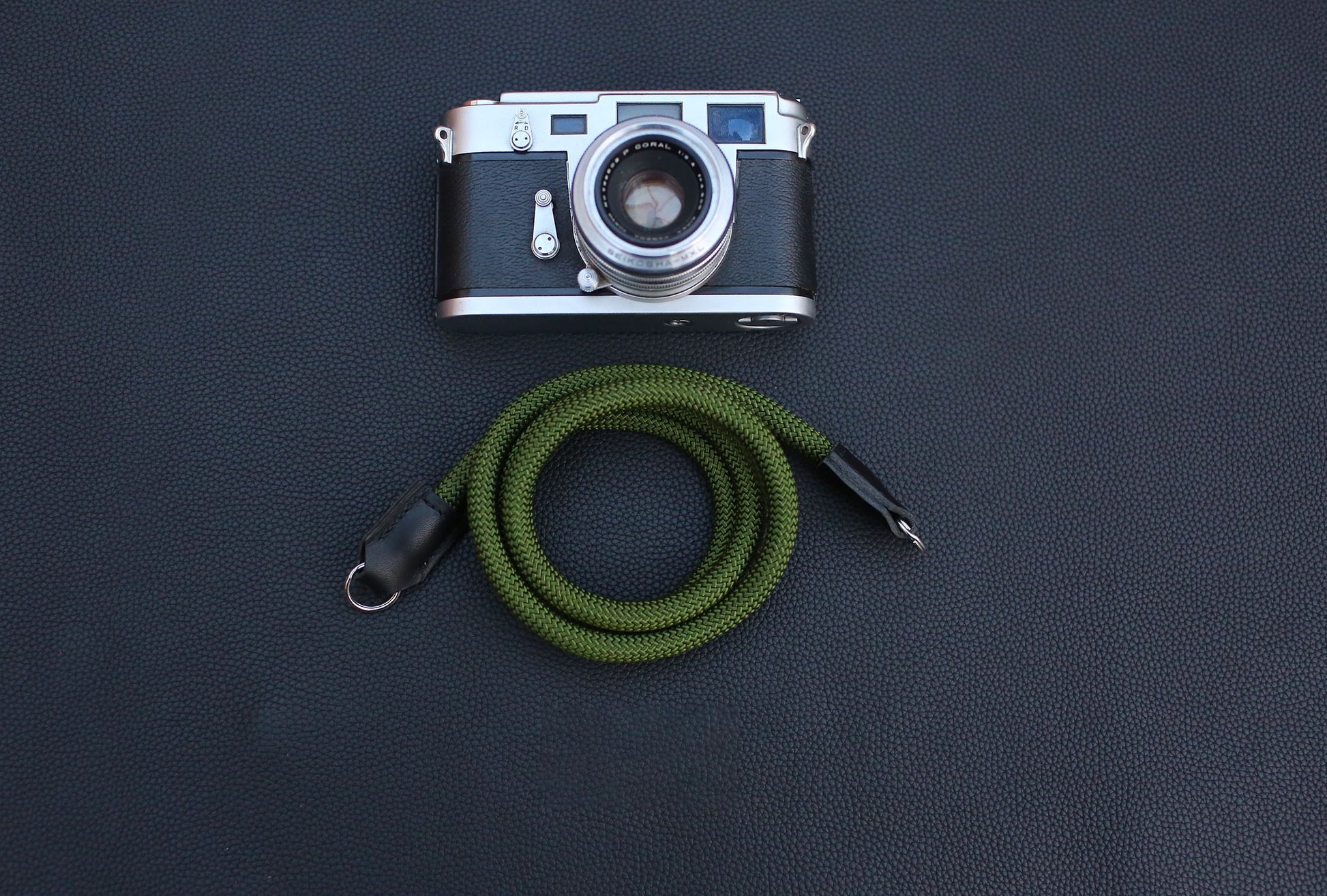 upgraded army green rope camera strap with thicker veg tan leather ends