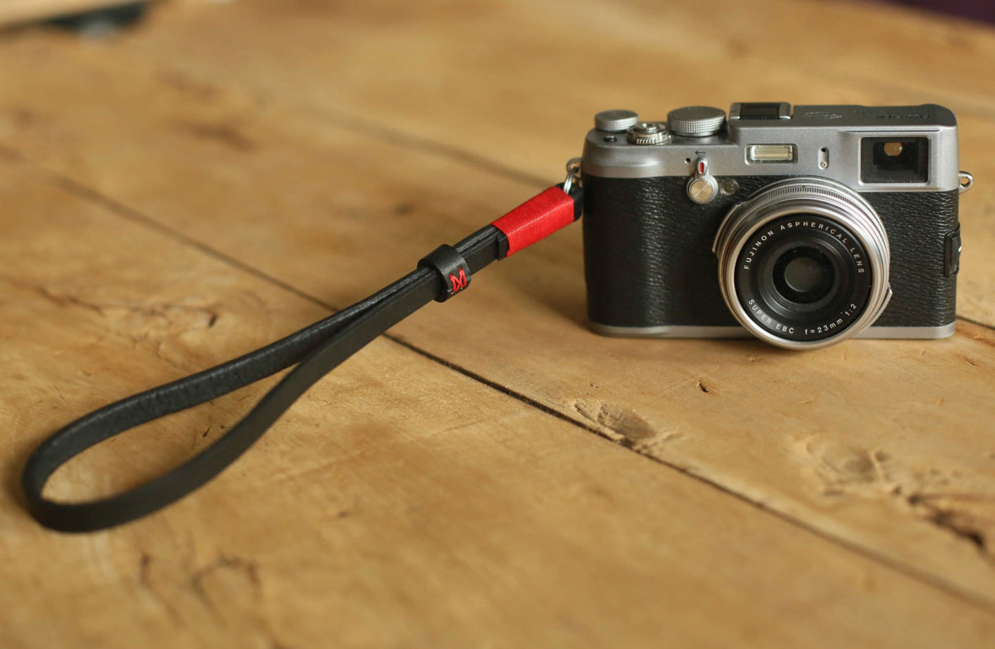 Wax-thread detail on handmade leather wrist strap
