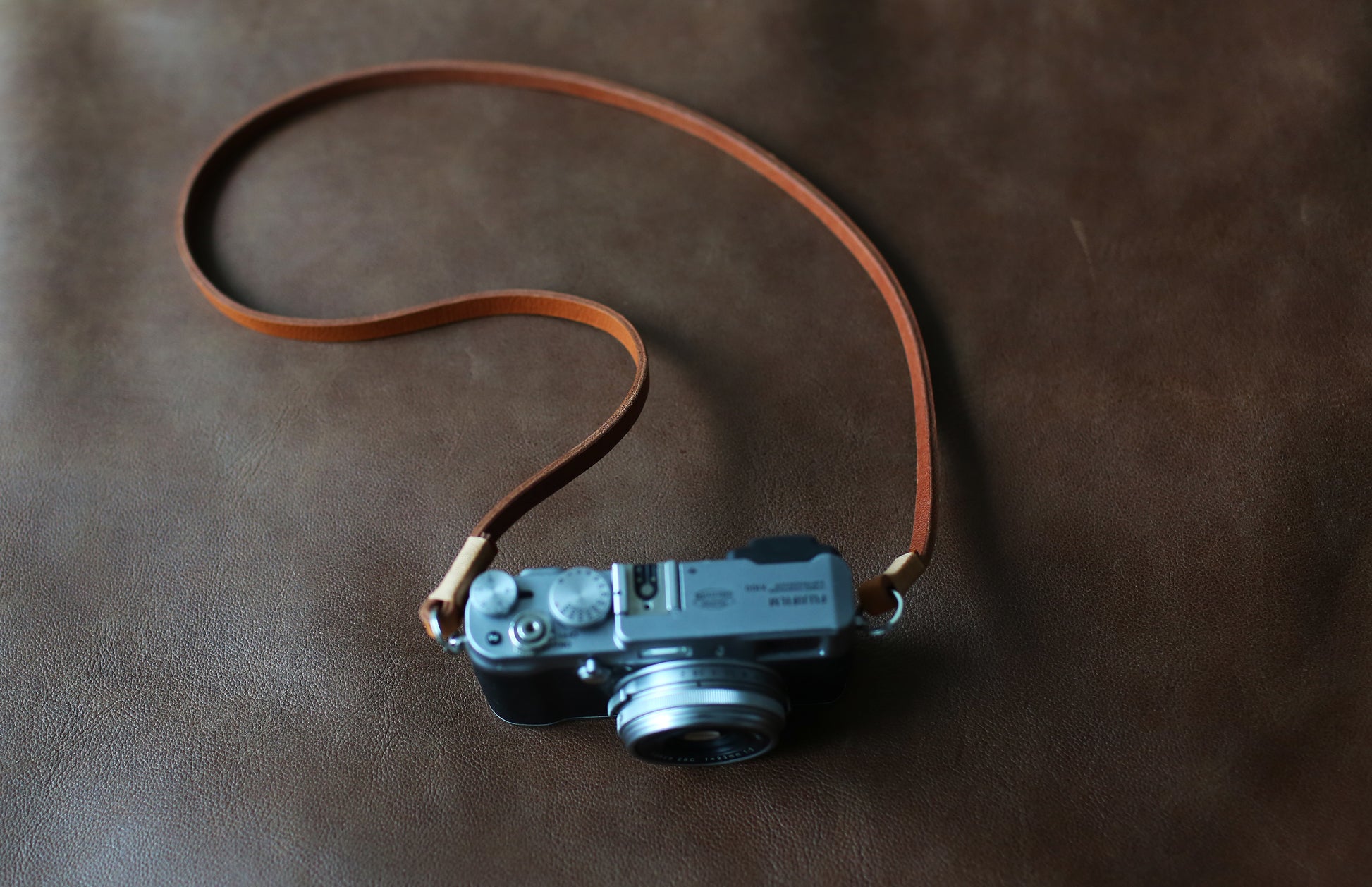 Vintage style brown leather camera neck strap for mirrorless and film cameras