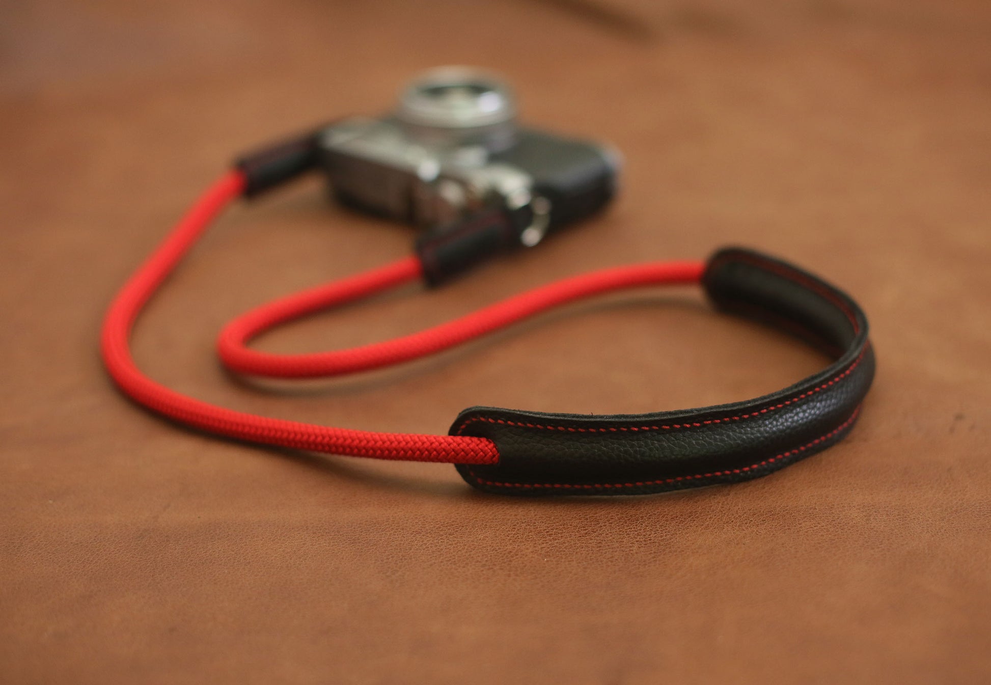 Black leather padded red rope strap for photography