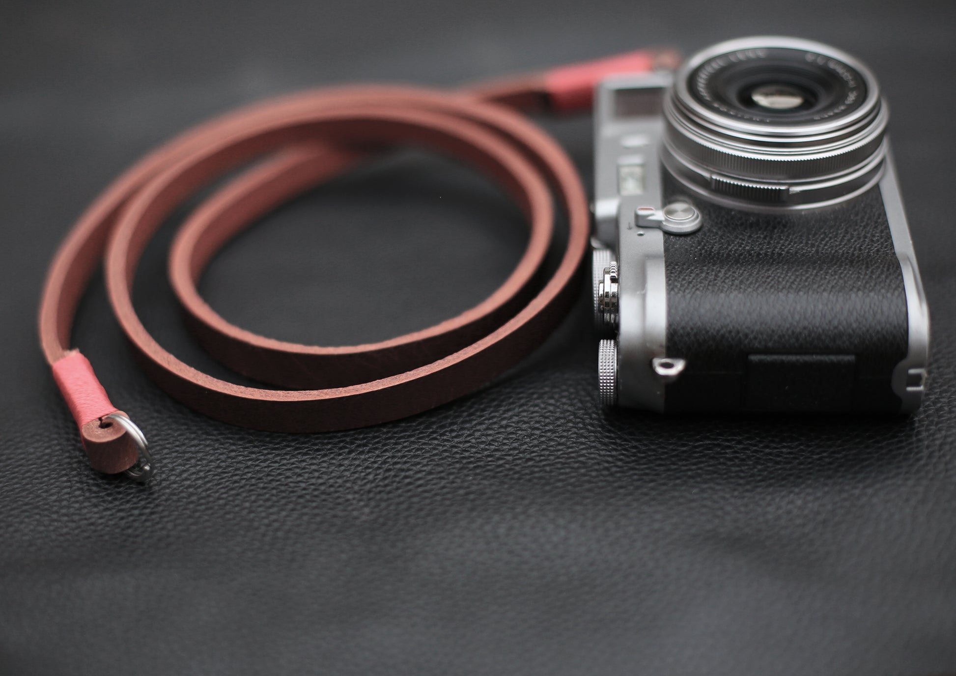 Brown leather strap with metal split ring attachment