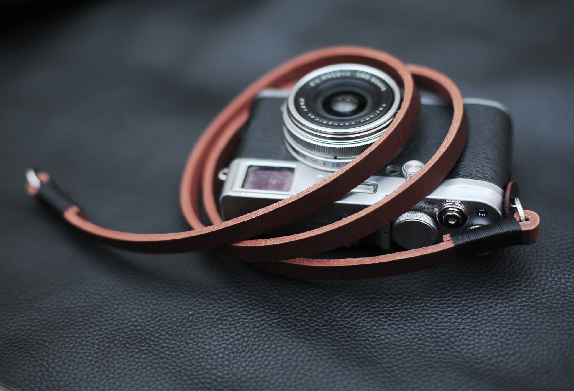 Vintage inspired leather camera strap flat lay