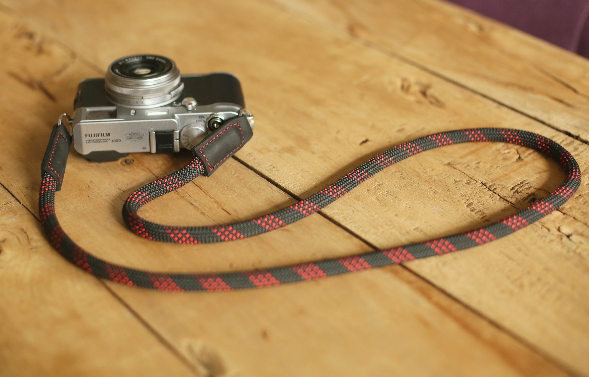 minimal camera strap made from braided rope and leather