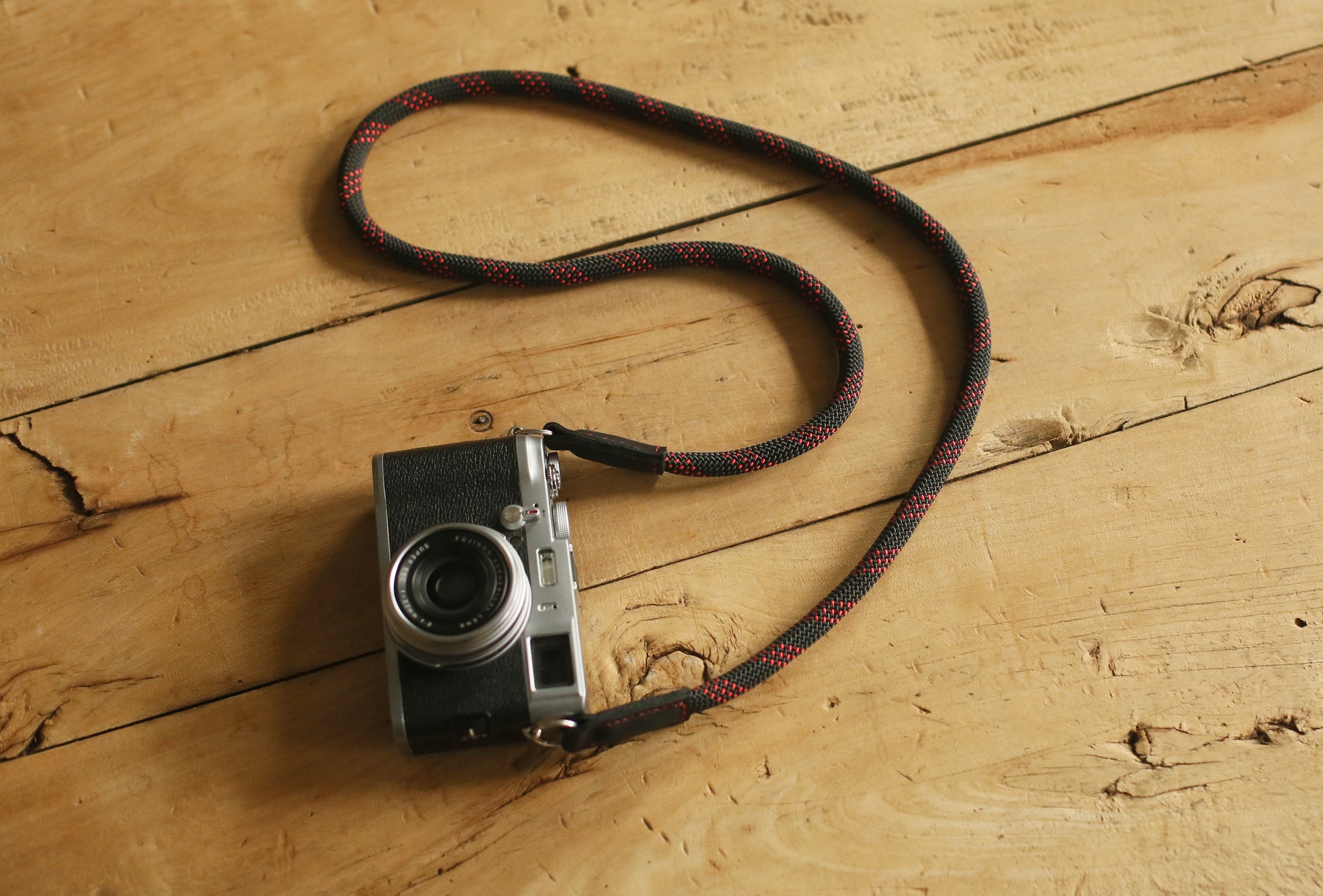 black and red interlaced rope strap for mirrorless camera