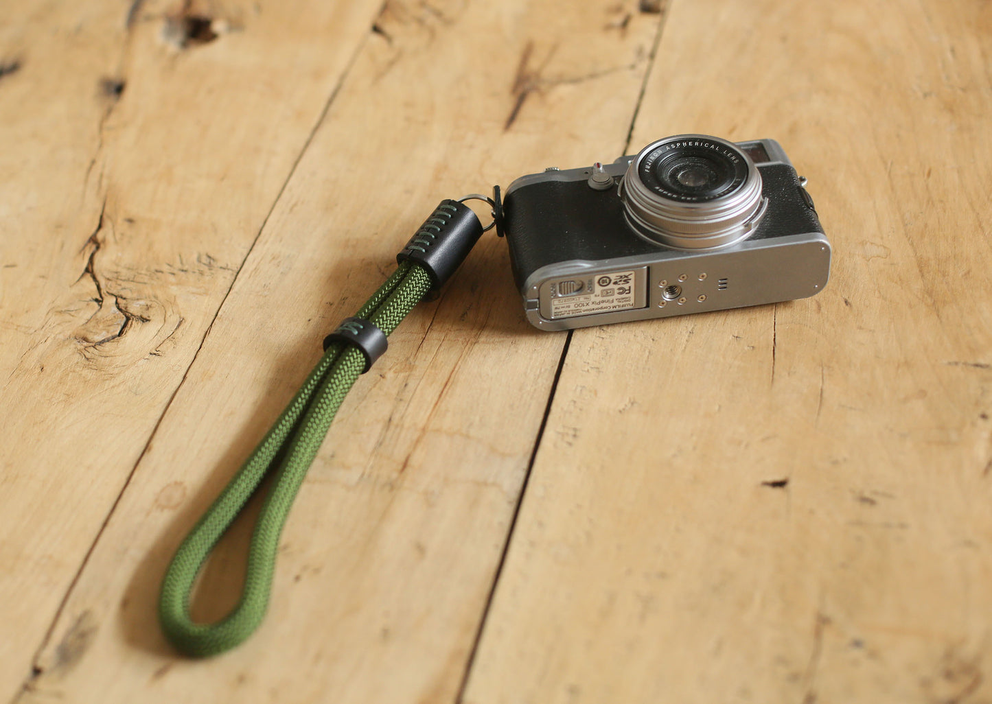 Minimalist wrist strap for mirrorless camera in military green