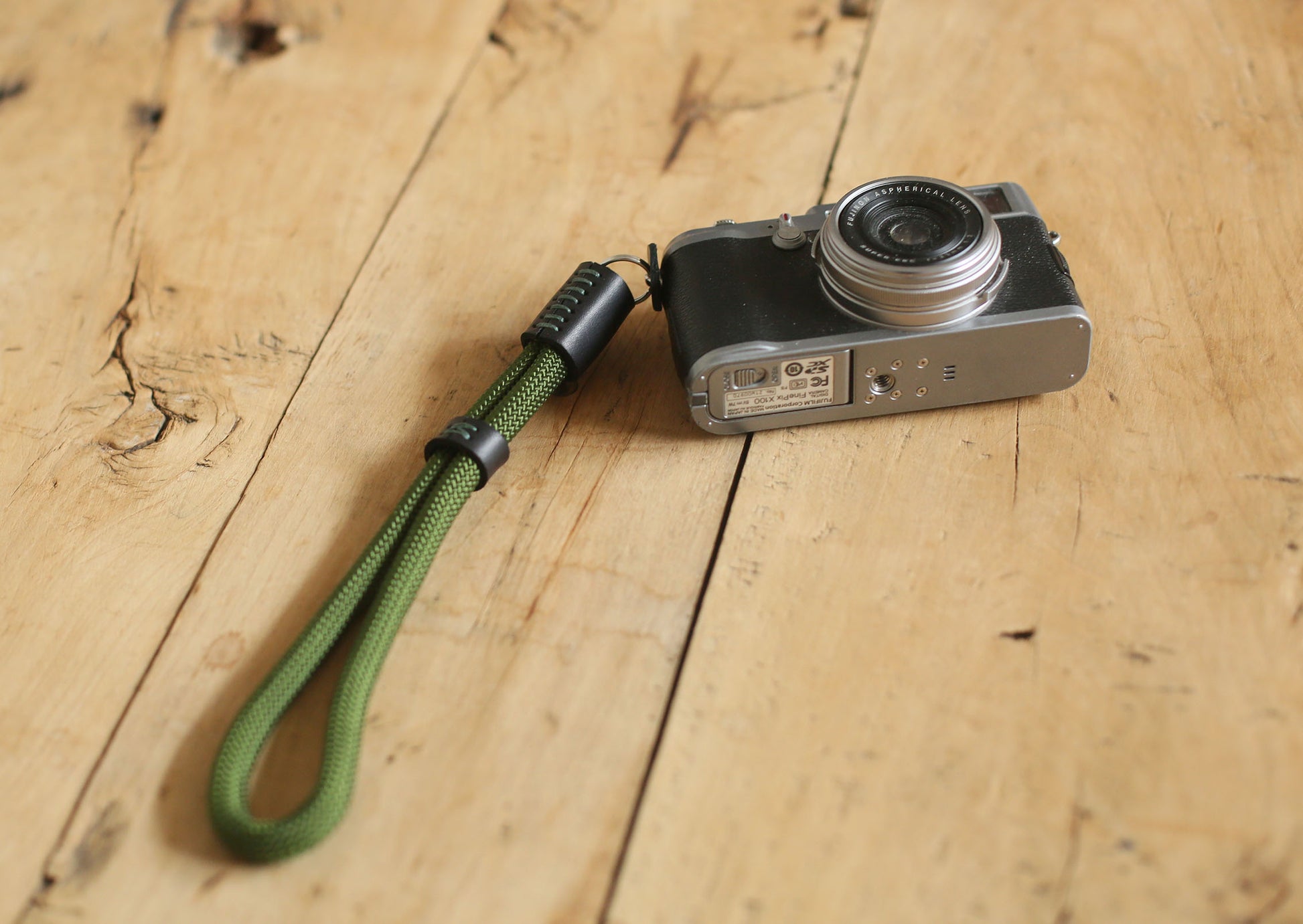 Minimalist wrist strap for mirrorless camera in military green