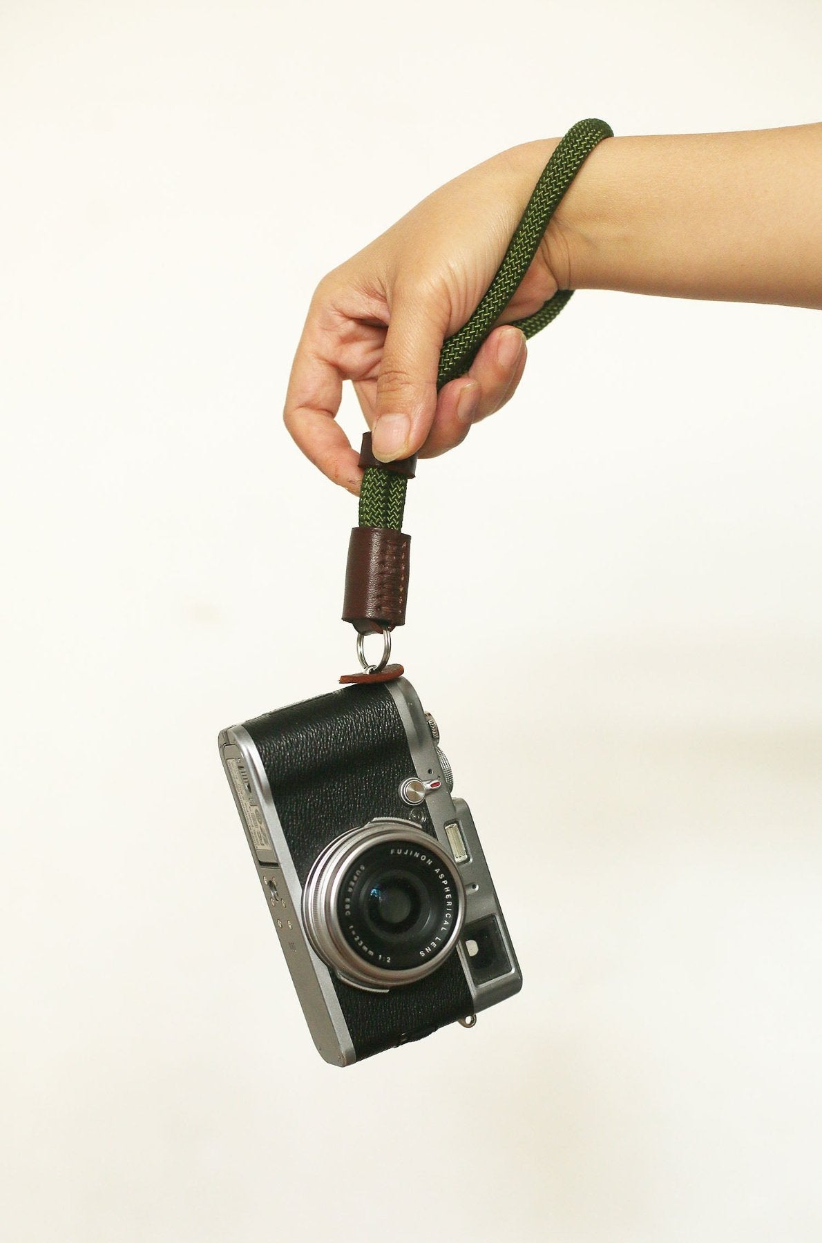 Military-inspired wrist strap for photographers