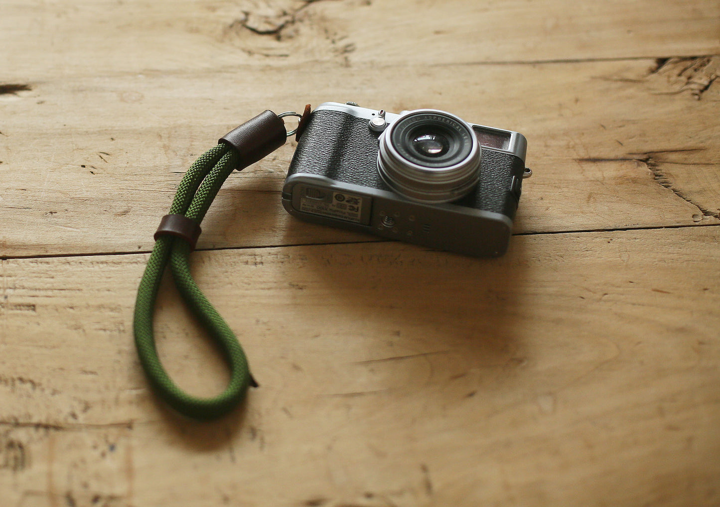 Handmade military-style green wrist strap for mirrorless camera