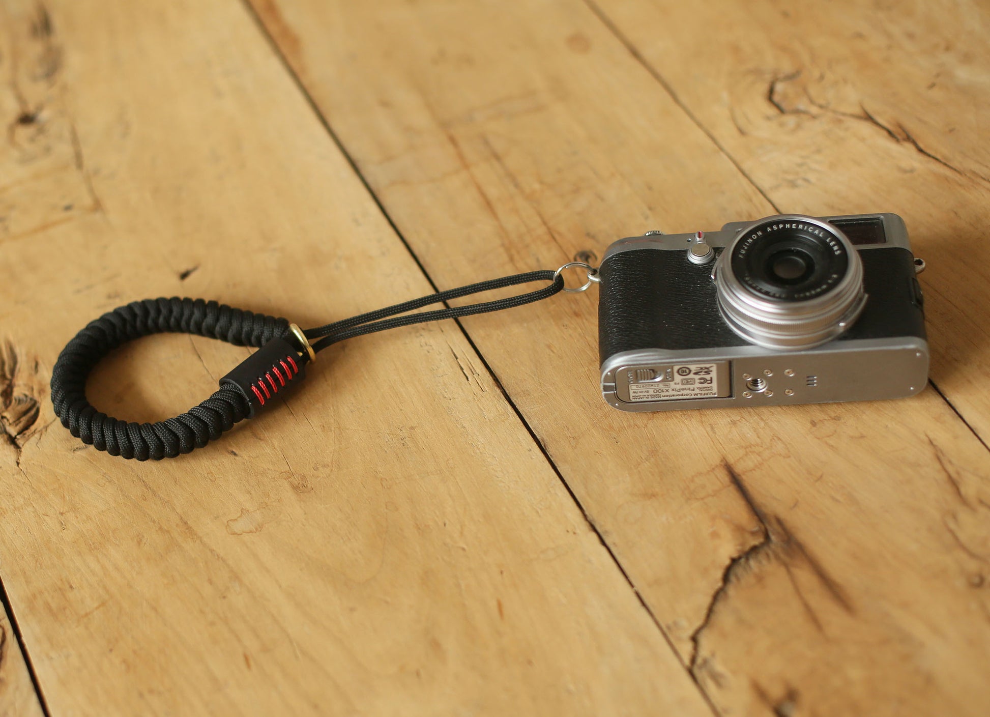 Handmade parachute rope camera wrist band with leather detail