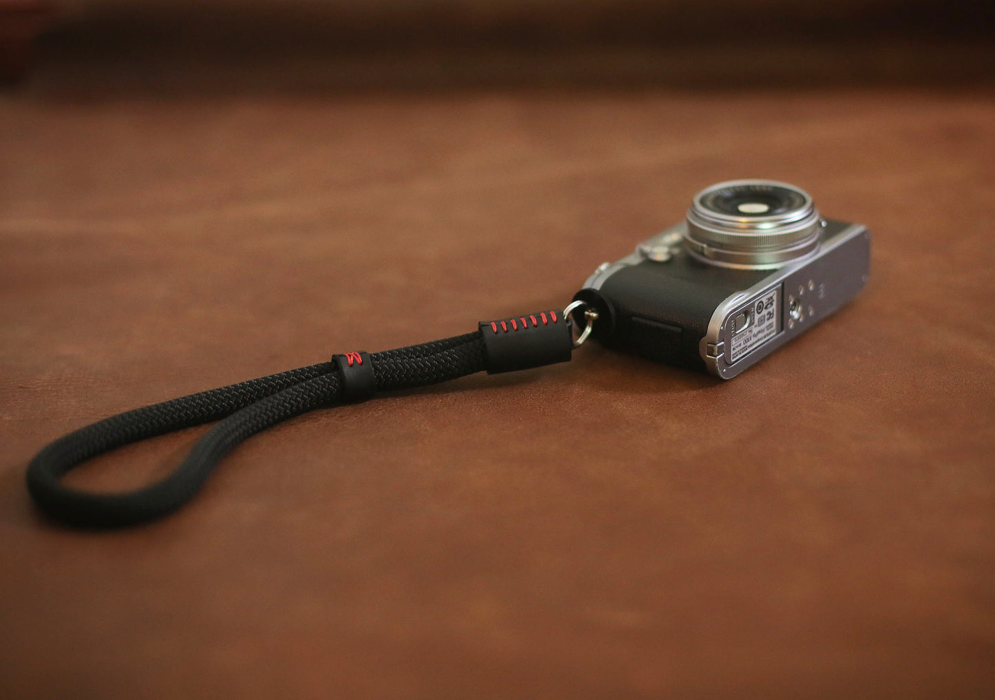 Minimalist wrist strap loop for DSLR and mirrorless