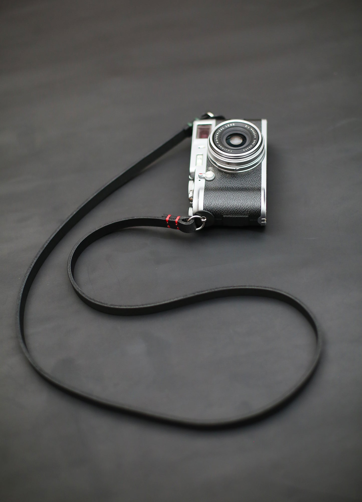 Premium full-grain black buffalo leather strap, durable and stylish for DSLR and mirrorless cameras