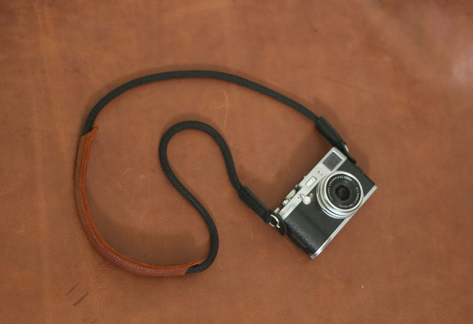 Leather guard pads preventing camera lug scratches