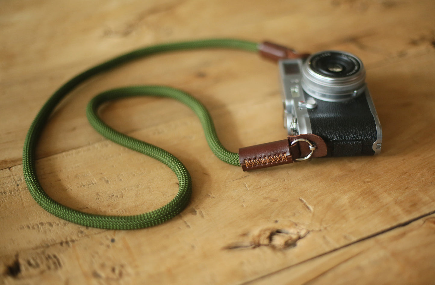 Army green climbing rope camera strap with tan leather ends